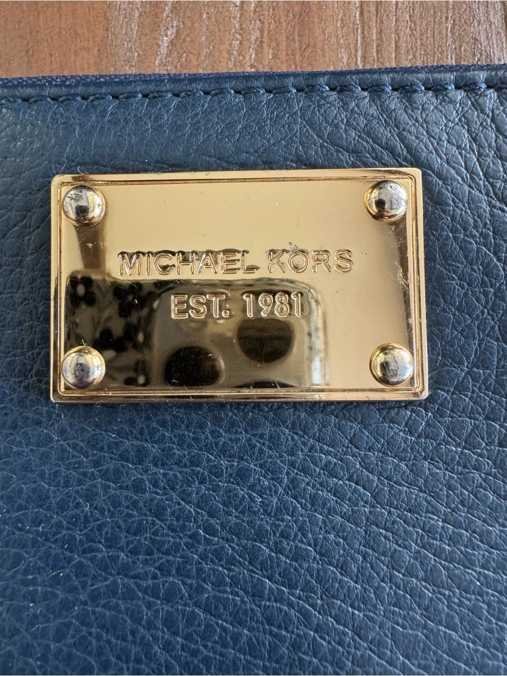 Michael Kors Deep Blue Pebbled Leather Zip Around Wallet with Gold Plate